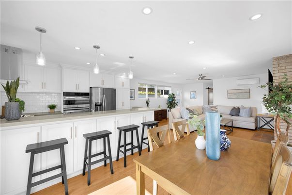 Dining room, Interior, Kitchen, Living room, Pendant Lights, Recessed Lighting, Stainless Steel Appliances, Wood Texture Flooring