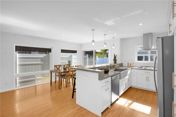 Dining room, Interior, Kitchen, Pendant Lights, Recessed Lighting, Stainless Steel Appliances, Wood Texture Flooring