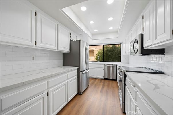 Interior, Kitchen, Recessed Lighting, Stainless Steel Appliances, Wood Texture Flooring