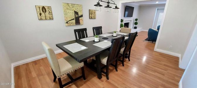 Dining room, Fireplace, Interior, Pendant Lights, Recessed Lighting, Wood Texture Flooring