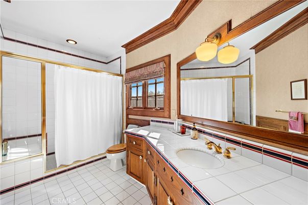 Bathroom, Dual Sink Vanities, Interior, Recessed Lighting, Tile Countertops