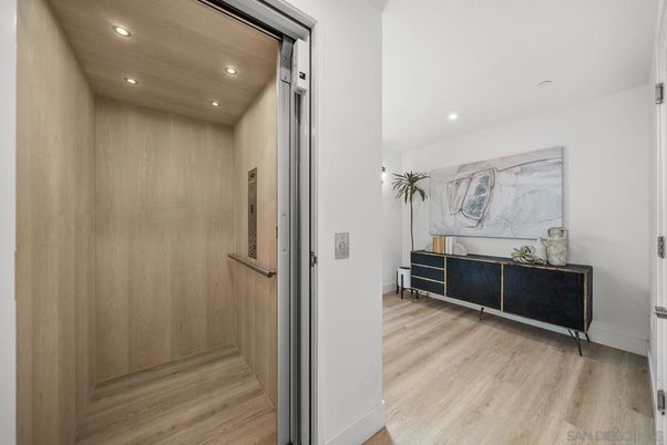 Elevator, Interior, Recessed Lighting, Wooden Ceilings, Wood Texture Flooring, Wooden Walls