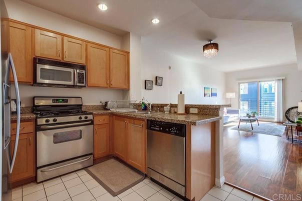 Dining room, Interior, Kitchen, Recessed Lighting, Stainless Steel Appliances, Wood Texture Flooring