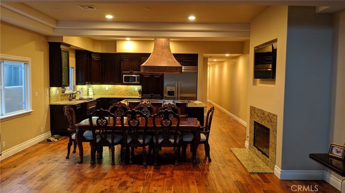 Dining room, Fireplace, Interior, Kitchen, Recessed Lighting, Wood Texture Flooring