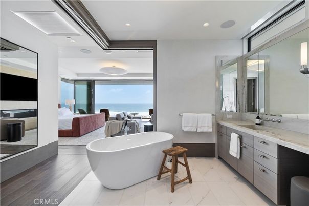 Bathroom, Bedroom, Dual Sink Vanities, Free Standing Baths, Interior, Marble, Recessed Lighting, Water, Wood Texture Flooring