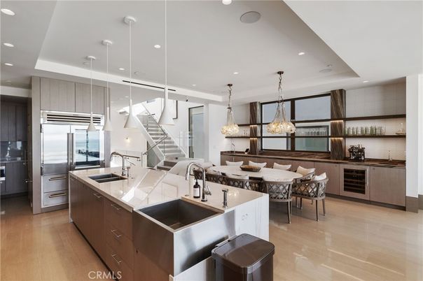 Chandelier, Dining room, Interior, Kitchen, Pendant Lights, Recessed Lighting, Stainless Steel Appliances, Wood Texture Flooring