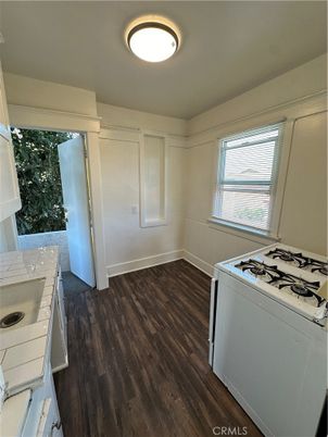 Interior, Kitchen, Tile Countertops, Wood Texture Flooring