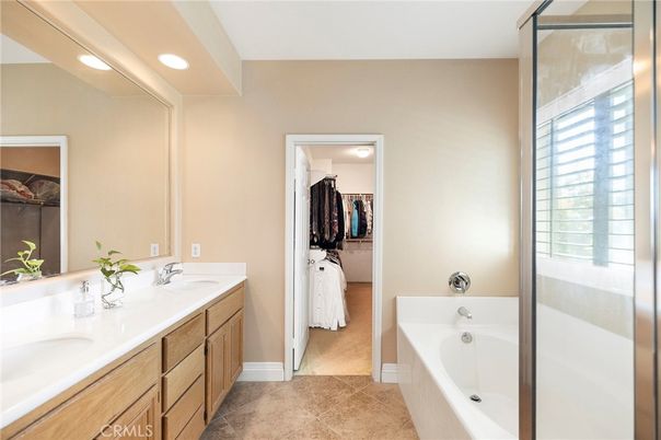 Bathroom, Dual Sink Vanities, Interior, Recessed Lighting, Walk-in Closets
