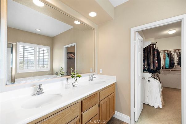 Bathroom, Dual Sink Vanities, Interior, Recessed Lighting, Walk-in Closets