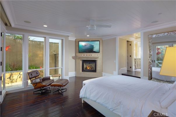 Bedroom, Fireplace, Interior, Recessed Lighting, Wood Texture Flooring