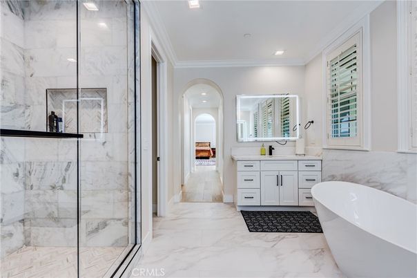 Bathroom, Dual Sink Vanities, Free Standing Baths, Glass Shower, Interior, Marble, Marble Walls, Recessed Lighting