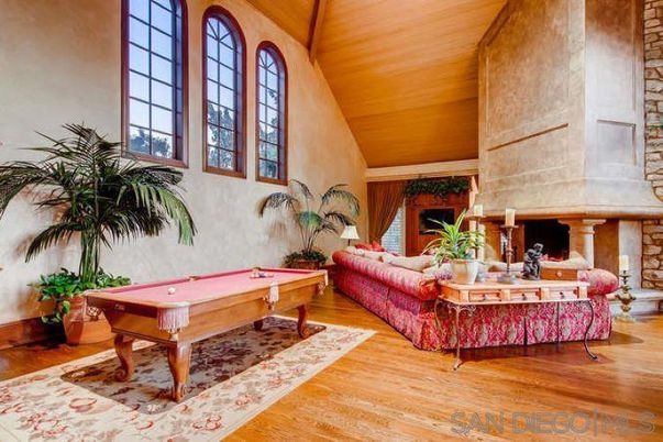 Billiard Table, Fireplace, Game Room, Interior, Living room, Stone Walls, Wooden Ceilings, Wood Texture Flooring