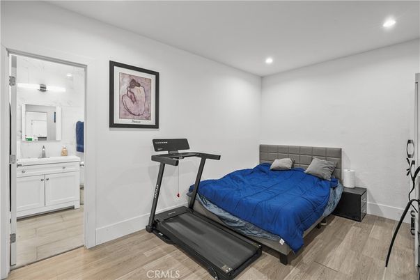 Bedroom, Fitness Equipment, Interior, Recessed Lighting, Wood Texture Flooring