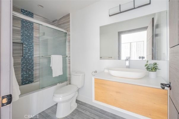 Bathroom, Glass Shower, Interior, Recessed Lighting, Wood Texture Flooring