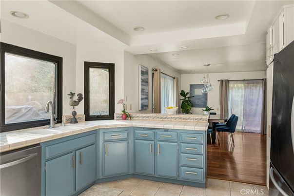 Dining room, Interior, Kitchen, Pendant Lights, Recessed Lighting, Tile Countertops, Wood Texture Flooring