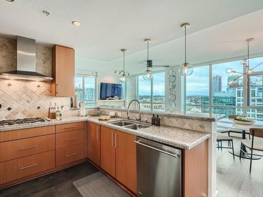Dining room, Interior, Kitchen, Pendant Lights, Recessed Lighting, Stainless Steel Appliances, Water, Wood Texture Flooring