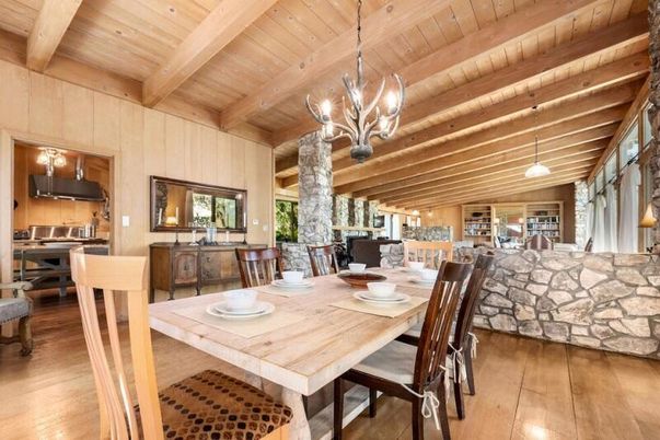 Chandelier, Dining room, Interior, Kitchen, Pendant Lights, Stainless Steel Appliances, Stone Walls, Wooden Beams, Wooden Ceilings, Wood Texture Flooring