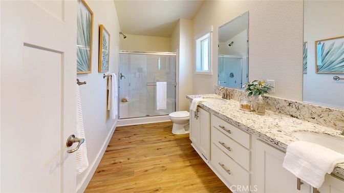 Bathroom, Dual Sink Vanities, Glass Shower, Interior, Wood Texture Flooring