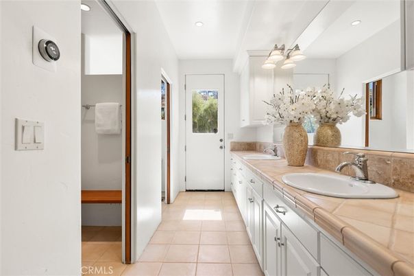 Bathroom, Dual Sink Vanities, Interior, Recessed Lighting, Tile Countertops
