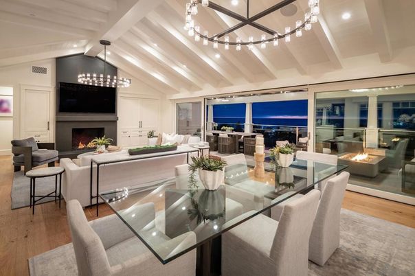 Chandelier, Dining room, Fireplace, Interior, Living room, Pendant Lights, Recessed Lighting, Wood Texture Flooring