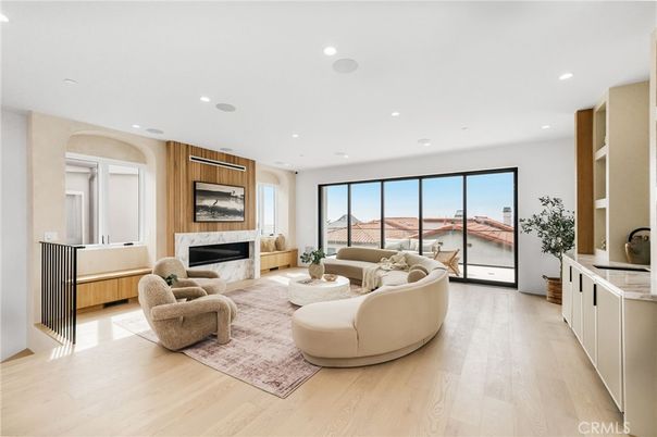 Fireplace, Interior, Living room, Recessed Lighting, Water, Wood Texture Flooring, Wooden Walls