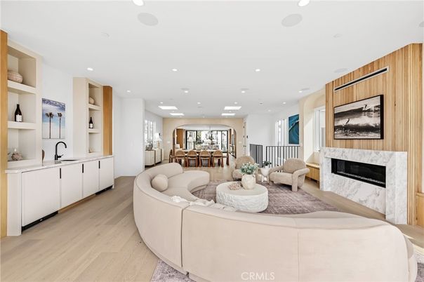 Dining room, Fireplace, Interior, Living room, Recessed Lighting, Wood Texture Flooring, Wooden Walls