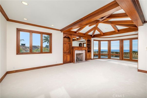 Empty room, Fireplace, Interior, Recessed Lighting, Water, Wooden Beams