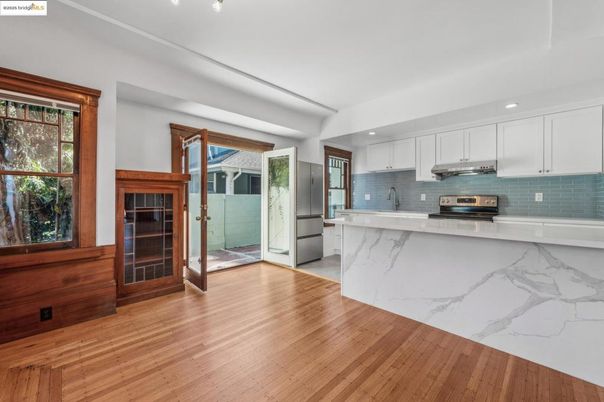 Interior, Kitchen, Marble Walls, Recessed Lighting, Stainless Steel Appliances, Wood Texture Flooring