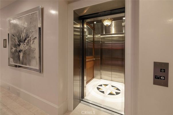 Chandelier, Elevator, Interior, Recessed Lighting, Wooden Walls