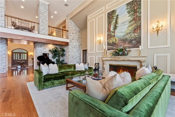 Fireplace, Interior, Living room, Piano, Recessed Lighting, Stone Walls, Wood Texture Flooring