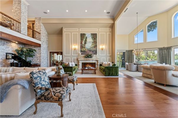 Fireplace, Interior, Living room, Pendant Lights, Piano, Recessed Lighting, Stone Walls, Wood Texture Flooring