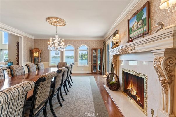 Chandelier, Dining room, Fireplace, Interior, Water, Wood Texture Flooring