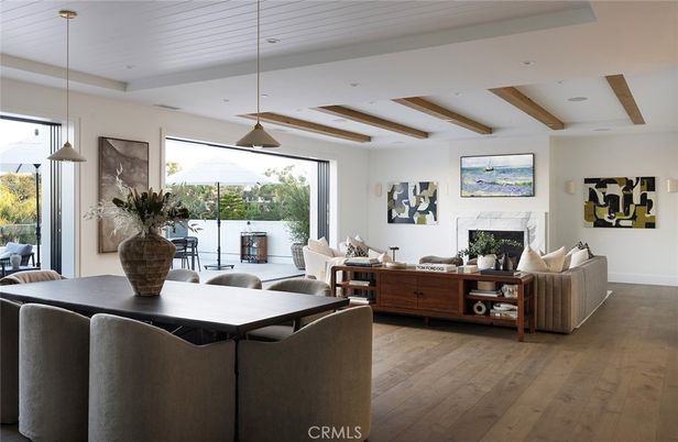 Dining room, Fireplace, Interior, Living room, Pendant Lights, Recessed Lighting, Wooden Beams, Wood Texture Flooring