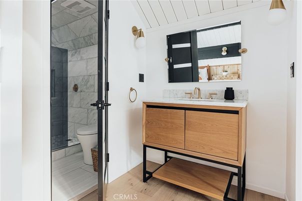 Bathroom, Glass Shower, Interior, Marble Walls, Wood Texture Flooring