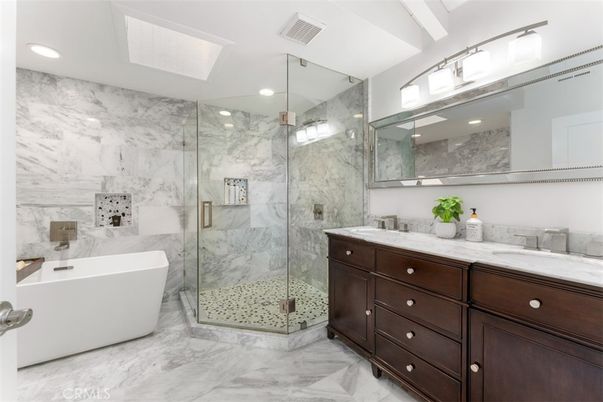 Bathroom, Dual Sink Vanities, Free Standing Baths, Glass Shower, Interior, Marble, Marble Walls, Recessed Lighting