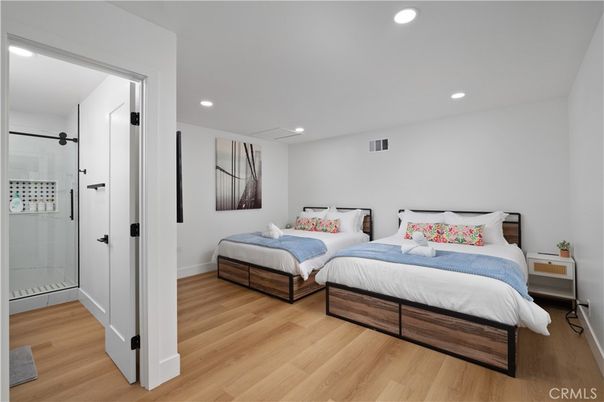 Bathroom, Bedroom, Glass Shower, Interior, Recessed Lighting, Wood Texture Flooring