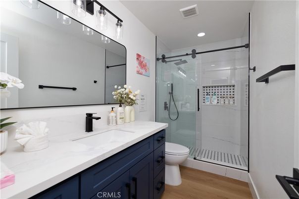 Bathroom, Glass Shower, Interior, Recessed Lighting, Wood Texture Flooring