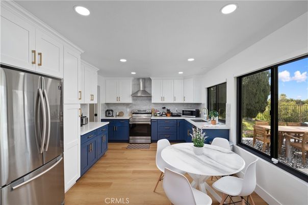 Dining room, Interior, Kitchen, Recessed Lighting, Stainless Steel Appliances, Wood Texture Flooring