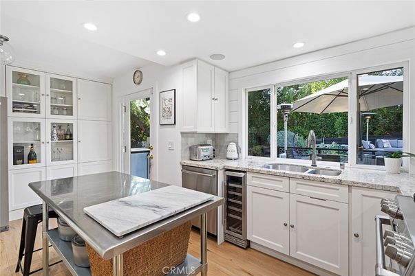 Dining room, Interior, Kitchen, Recessed Lighting, Stainless Steel Appliances, Wood Texture Flooring