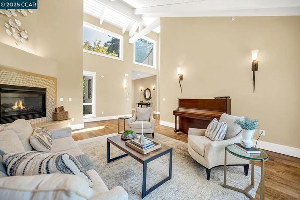 Fireplace, Interior, Living room, Piano, Recessed Lighting, Wood Texture Flooring