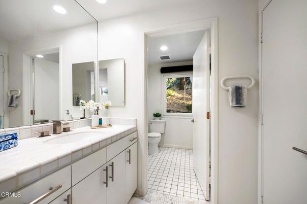 Bathroom, Dual Sink Vanities, Interior, Recessed Lighting, Tile Countertops