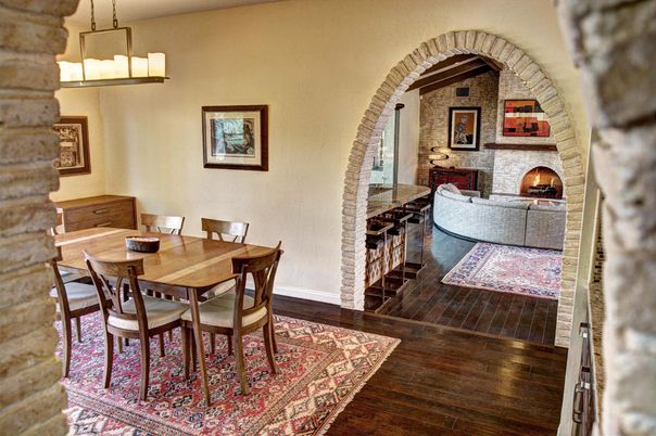 Dining room, Fireplace, Interior, Pendant Lights, Stone Walls, Wood Texture Flooring