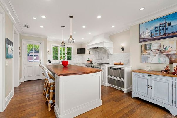 Interior, Kitchen, Marble Walls, Pendant Lights, Recessed Lighting, Stainless Steel Appliances, Wood Texture Flooring