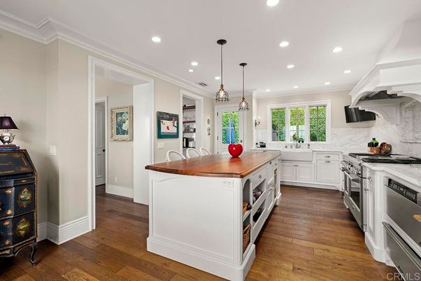 Interior, Kitchen, Marble Walls, Pendant Lights, Recessed Lighting, Stainless Steel Appliances, Wood Texture Flooring