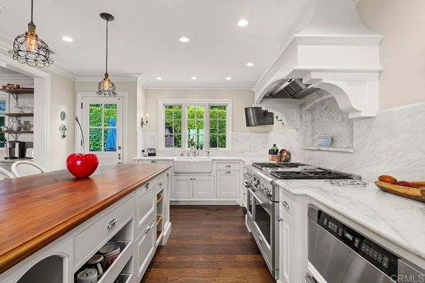 Interior, Kitchen, Marble Walls, Pendant Lights, Recessed Lighting, Stainless Steel Appliances, Wood Texture Flooring
