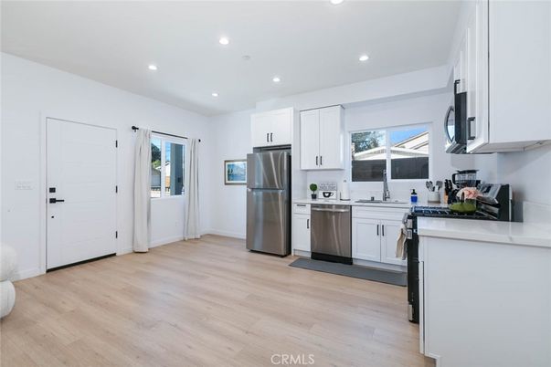 Interior, Kitchen, Recessed Lighting, Stainless Steel Appliances, Wood Texture Flooring