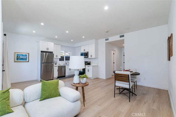 Dining room, Interior, Kitchen, Recessed Lighting, Stainless Steel Appliances, Wood Texture Flooring