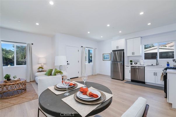 Dining room, Interior, Kitchen, Recessed Lighting, Stainless Steel Appliances, Wood Texture Flooring