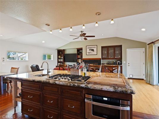 Dining room, Fireplace, Interior, Kitchen, Recessed Lighting, Wood Texture Flooring