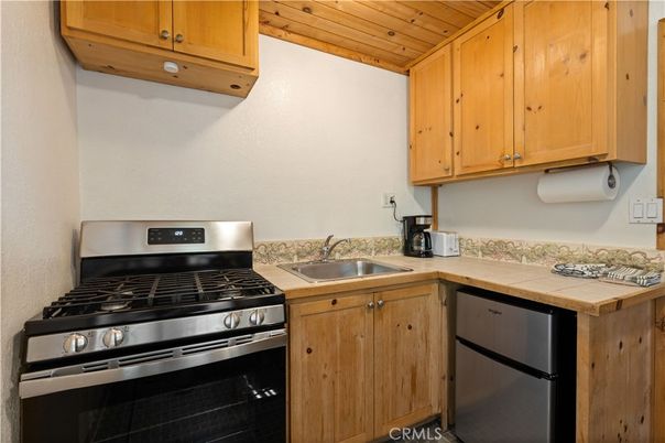 Interior, Kitchen, Tile Countertops, Wooden Ceilings